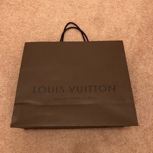 Louis Vuitton shopping bag.